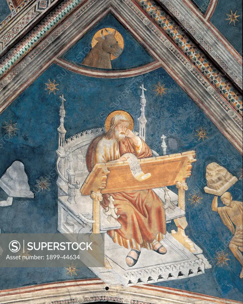 Evangelists, by Master of the Four Elements, 14th Century, fresco. Italy: Lombardy: Lodi: San Francesco church. Detail. St Lucas throne blue gold bookrest/bookstand blue stars ox