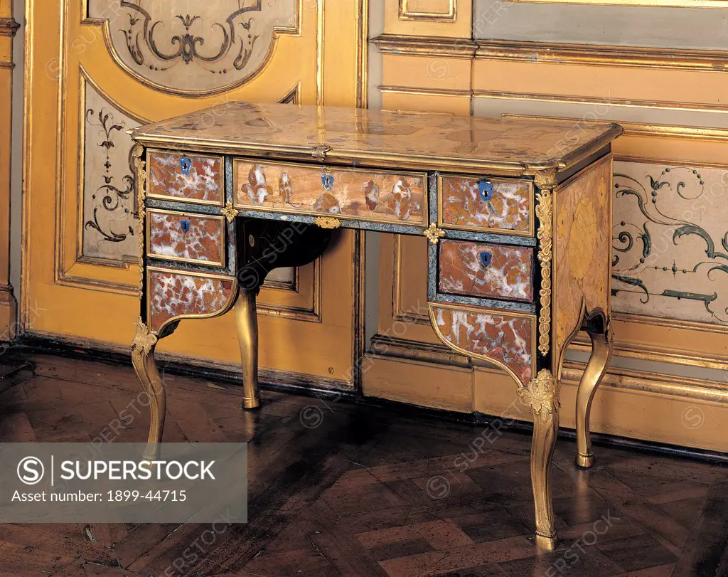 Writing desk, by Piedmont Work, 18th Century, inlaid marbles and gilded metal. Italy: Piemonte: Turin: Royal Palace. Whole artwork. Writing desk drawers top marbles volutes rinceaux