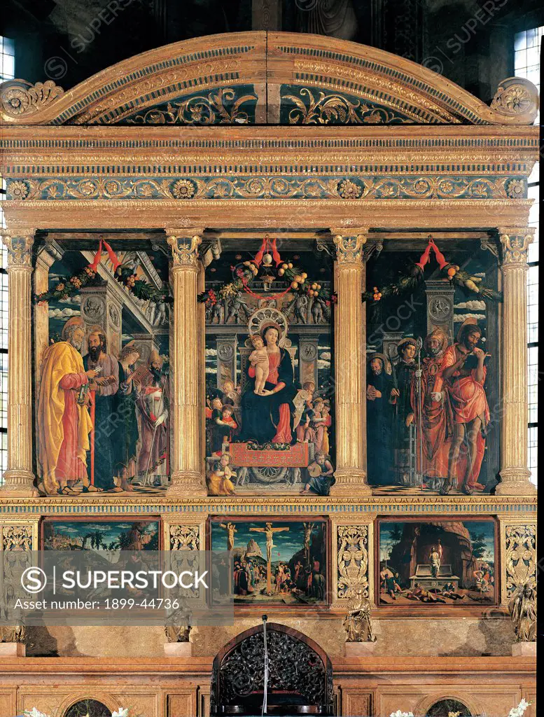 San Zeno Altarpiece (Holy Conversation), by Mantegna Andrea, 1456 - 1459, 15th Century, tempera on panel, polyptych, gilded frame. Italy. Veneto. Verona. San Zeno Maggiore basilica. altar. Whole artwork. Polyptych, wooden golden frame/cornice, only the triptych of the Sacred Conversation is original, predella with copies of of Prayer in the Garden, The Crucifixion, The Resurrection