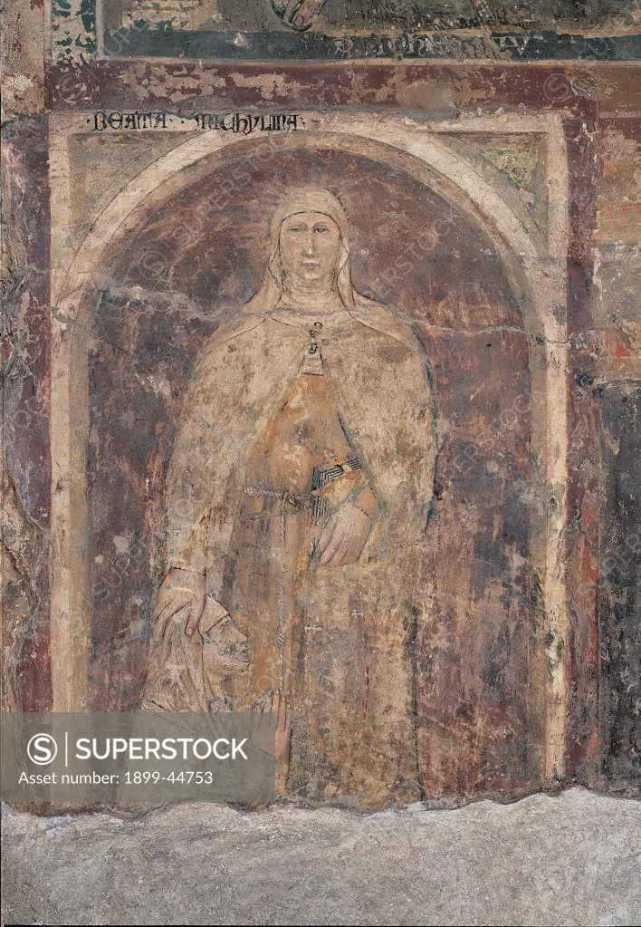 Blessed Michelina, by Verona Artist, 14th Century, fresco. Italy: Veneto: Verona: San Fermo Maggiore Church. Whole artwork. In a niche saint depicted standing with client kneeling at her feet