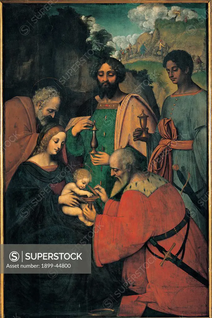 The Adoration of the Magi, by Giovanni Agostino da Lodi known as Pseudo Boccaccino, Marco d'Oggiono, 1515 - 1520, 16th Century, oil on poplar panel. Italy: Lombardy: Milan: Brera Art Gallery. Whole artwork. On the right side holy family Child Jesus Joseph Mary at the left side weise men/The Magi Melchior Balthasar Caspar beard adoration gold silver myrrh sumptuous habits/tunics background cavalcade of The Magi clouds