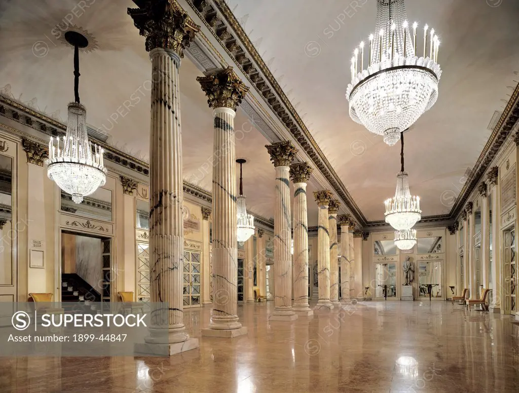 Views of the Teatro alla Scala, Milan, after its restoration in 2004, by Piermarini Giuseppe, 2004, 21st Century, . Italy: Lombardy: Milan: Teatro alla Scala. View foyer columns stairs marble floor mirrors chandelier capitals gold frame/cornice statue Giuseppe Verdi