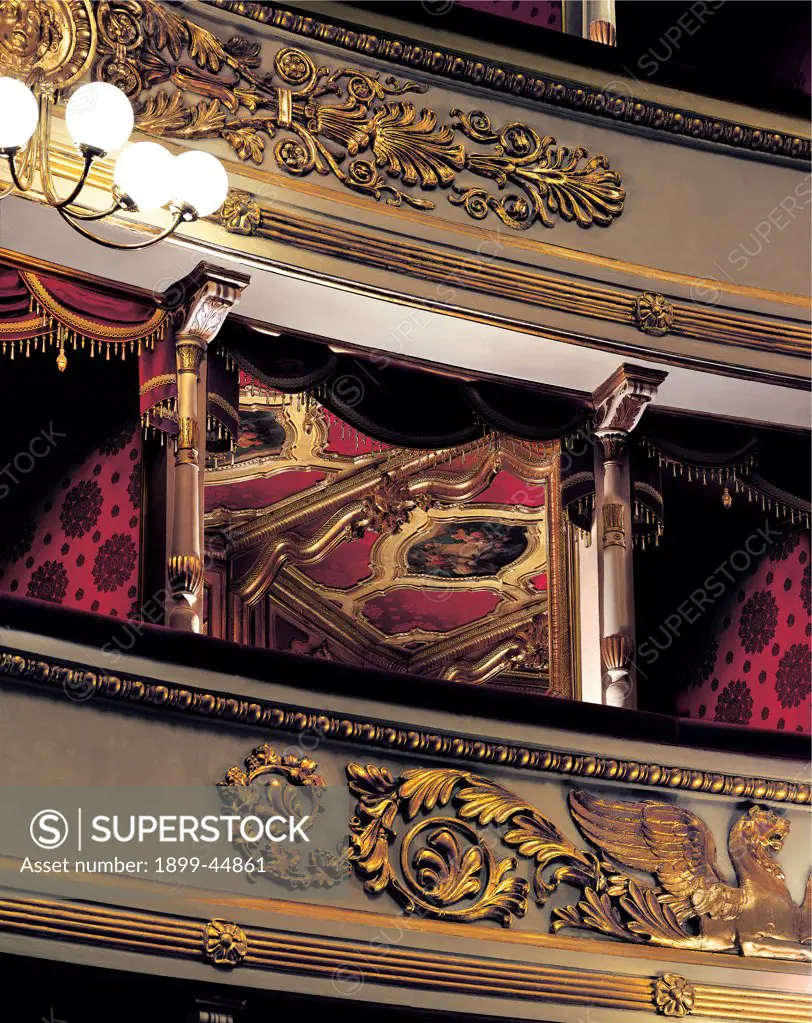 Views of the Teatro alla Scala, Milan, after its restoration in 2004, by Piermarini Giuseppe, 2004, 21st Century, . Italy: Lombardy: Milan: Teatro alla Scala. Detail. Gold frame/cornice box red ceiling chandelier