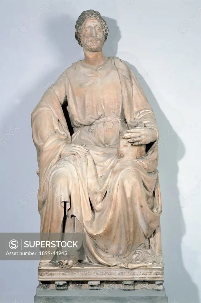 St Luke, by Nanni di Banco, 1408 - 1415, 15th Century, marble. Italy: Tuscany: Florence: Opera di Santa Maria del Fiore Museum. Whole artwork. St Luke apostle book man robe/dress statue