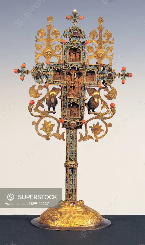 Benedictory cross, by Byzantine Work, 16th Century, carved wood, gold and silver, enamels, coral and pearls, stones. Italy: Umbria: Perugia: Assisi: Treasury Museum of San Francesco Basilica. Front blessing cross rinceaux birds gold light blue/azure