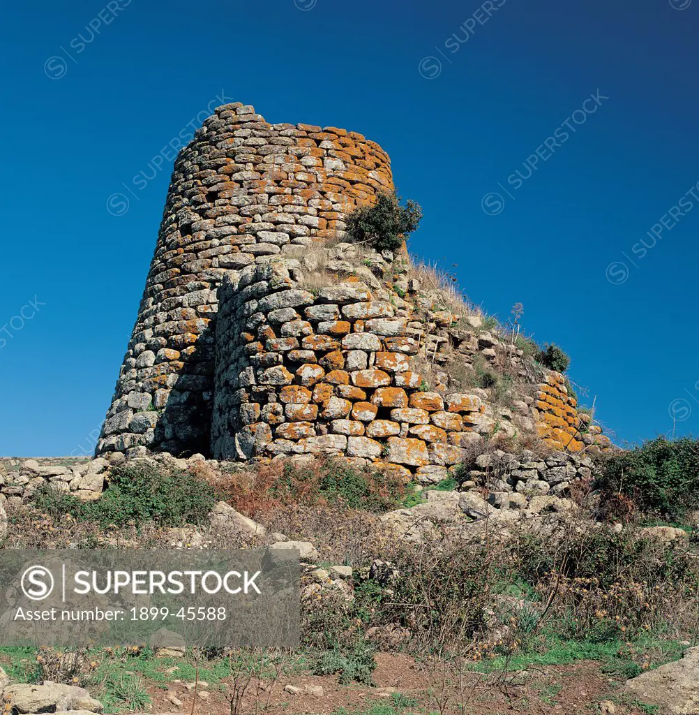 Nuraghe at S'Orolo, by Unknown artist, 8th Century b.C., 2nd Century a.D., . Italy: Sardegna: Nuoro: Bortigali. View of nuraghe at St Orolo trilobate central tower tholos wall bastion large squared basalt blocks