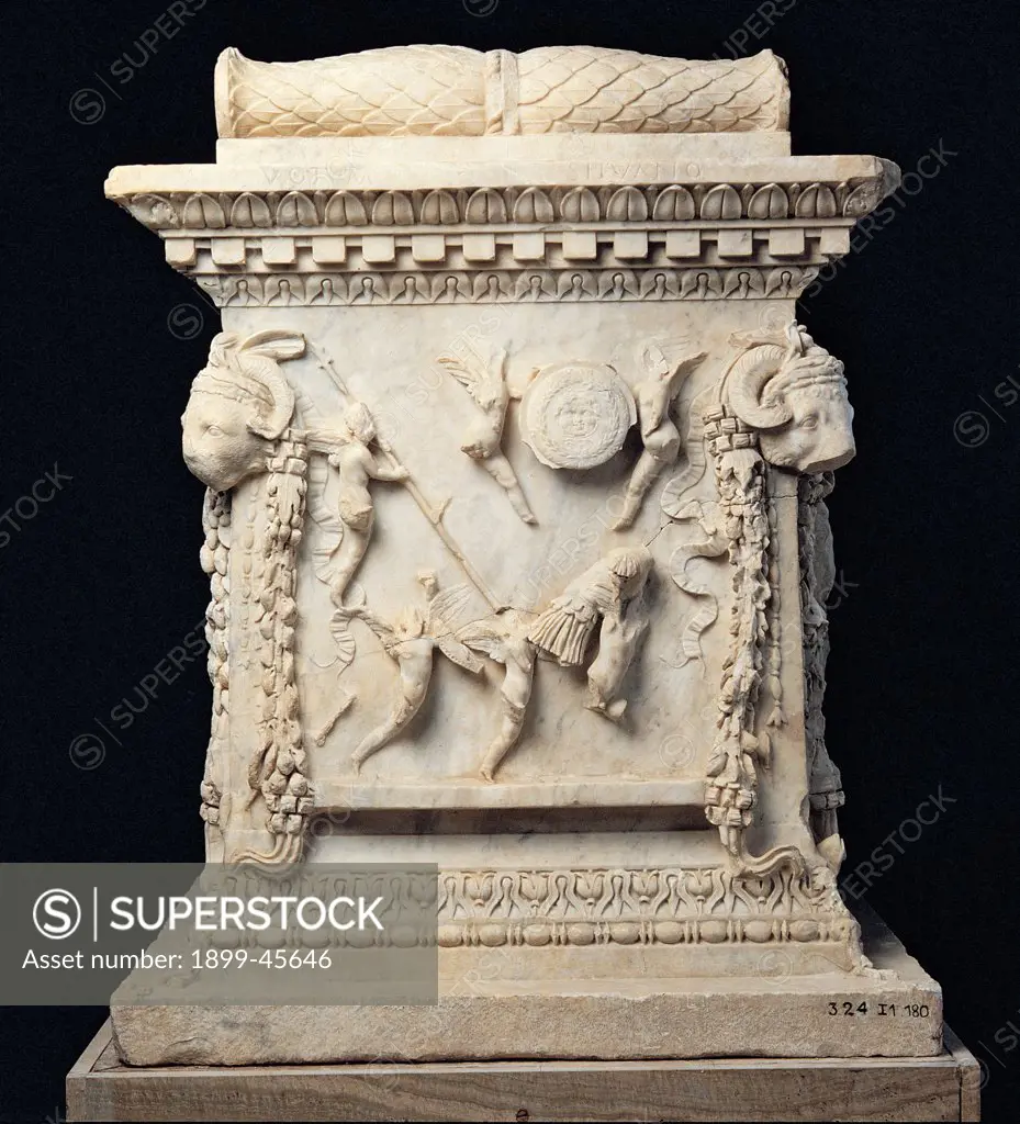Altar of Mars and Venus, by Unknown artist, 53 - 117,, Luni Marble. Italy. Lazio. Rome. Palazzo Massimo alle Terme. Sala V - inv. 324. View of a side depicting cupids playing with the arms of Mars Cupid garlands ram altar from the arcade of Palace of the Corporazioni in Ostia (1880) - State of preservation of many breaks and cracks, fragmentary protomorphic rams