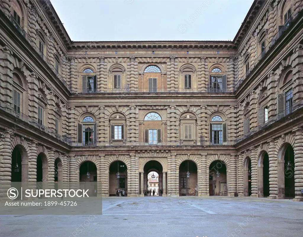 The courtyard of Palazzo Pitti, Florence, by Ammannati Bartolomeo, 1550, 16th Century, . Italy: Tuscany: Florence: Palazzo Pitti. Exterior noble Palazzo Pitti courtyard triple row rustication arches portico windows
