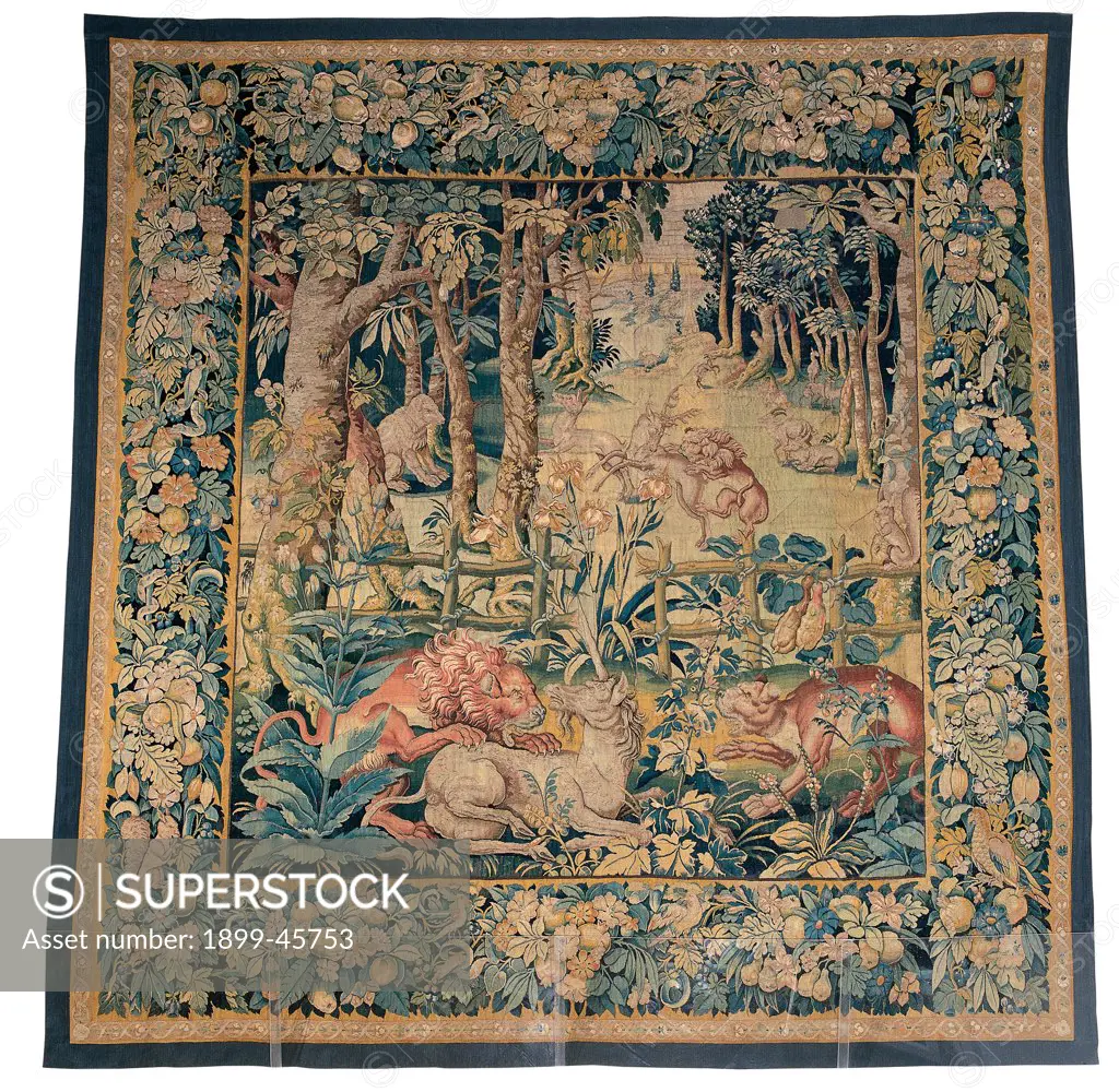 Landscapes with animals, by Craftsmanship of Bruxelles, 17th Century, tapestry. Italy: Marche: Pesaro Urbino: Urbino: Galleria Nazionale delle Marche. Whole artwork. Tapestry rug carpet edge decoration flowers fruit pomegranates vegetable shoots leaves forest fence trees foliage bear deer lions unicorn green yellow ochre
