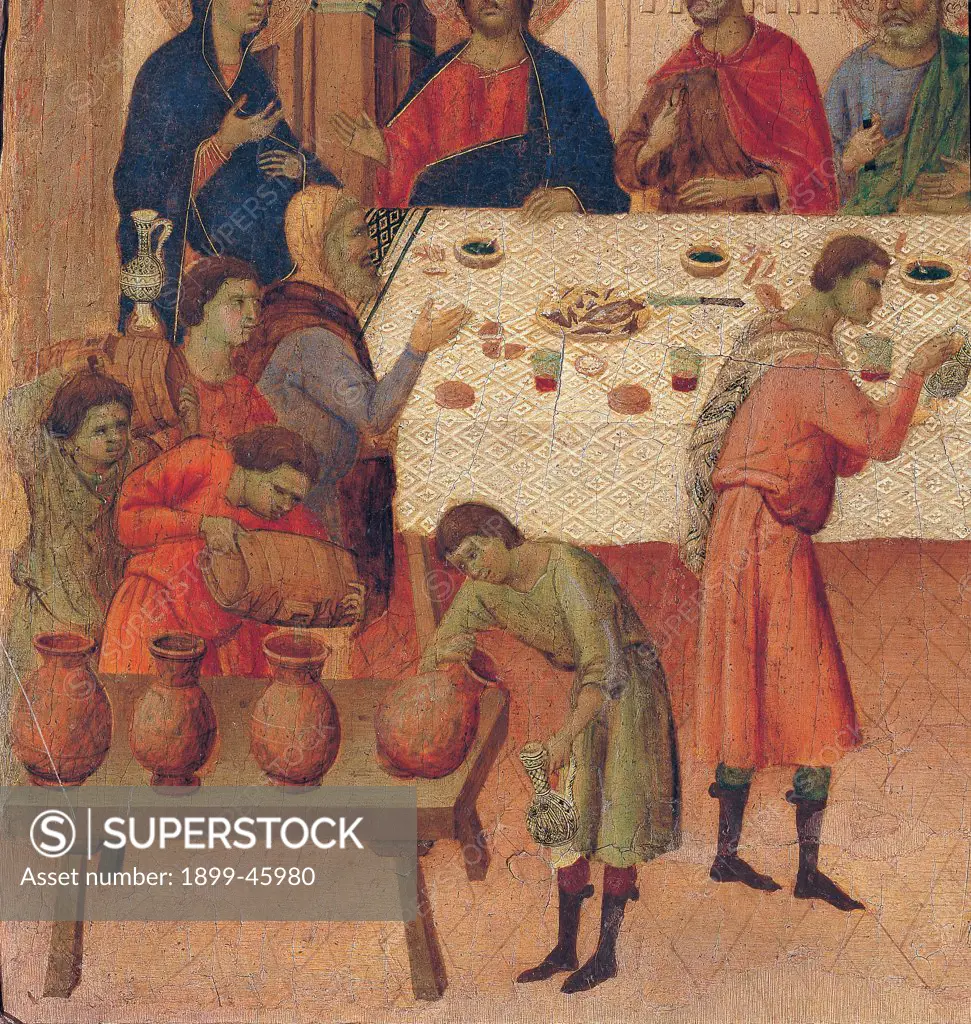 The Maesta, front, by Duccio di Buoninsegna, 1308 - 1311, 14th Century, tempera on panel. Italy. Tuscany. Siena. Cathedral. Verso, predella panel. Detail of Wedding at Cana. The servants pour wine out of the carafes and put it on the laid table.