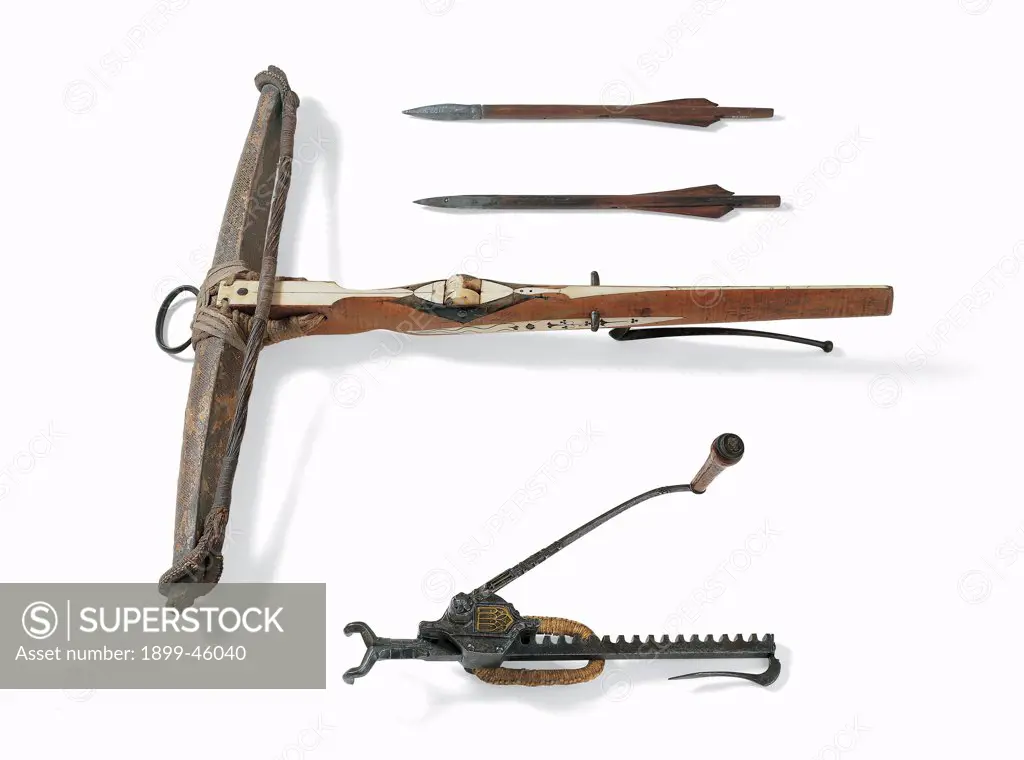 Crossbow, jack and crossbow darts, by German work, 1480 - 1510, 15th Century, wood, horn, iron, cord, leather. Italy: Lazio: Rome: National Museum of Palazzo Venezia: Collezione Odescalchi 1777 1327-8. Whole artwork. Bow parchment string stirrup tendon wooden stock trigger pins hexagon box pulley handlebar gear toothed shaft quadrangular tips feathers