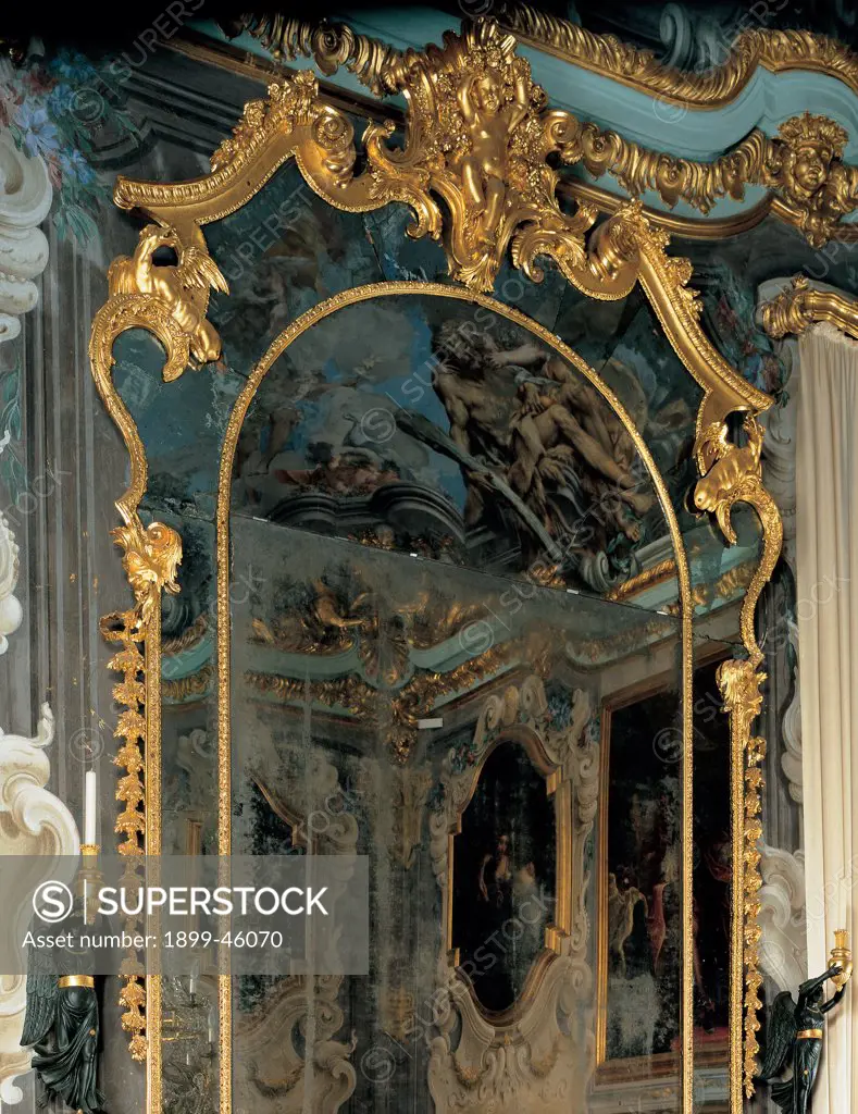 Pier-glass, by Mongiardino Francesco Maria, 1736, 18th Century, inlaid and gilded wood. Italy: Liguria: Genoa: National Gallery of Palazzo Spinola. Detail. Pier-glass mirror frame rinceaux volutes decoration gold stuccowork