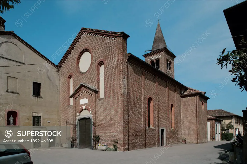 Church of San Lorenzo in Monlue, by Unknown artist, 1267, 13th Century, . Italy: Lombardy: Milan: San Lorenzo a Monlue church. Whole artwork. View church of San Lorenzo in Monlue nave gabled facade rose-window one-light side-windows central doorway with pediment hanging arches molding one-light windows side-aisles bell-tower campanile with spire two-light windows brick