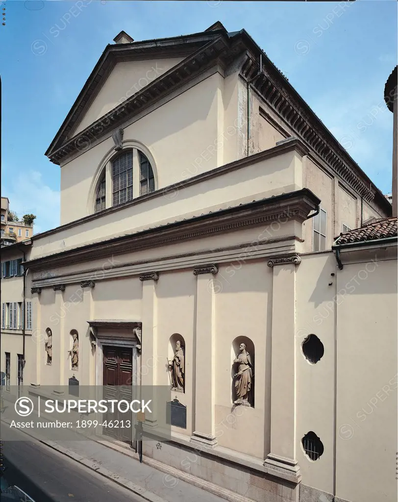 Church of Sant'Antonio Abate, by Unknown artist, 1272, . Italy: Lombardy: Milan: Sant'Antonio Abate church and monastery. View facade neo-Classicism Ionic pilaster strips supporting architrave varying lines of projection and unfinished frieze triangular pediment niche with statues