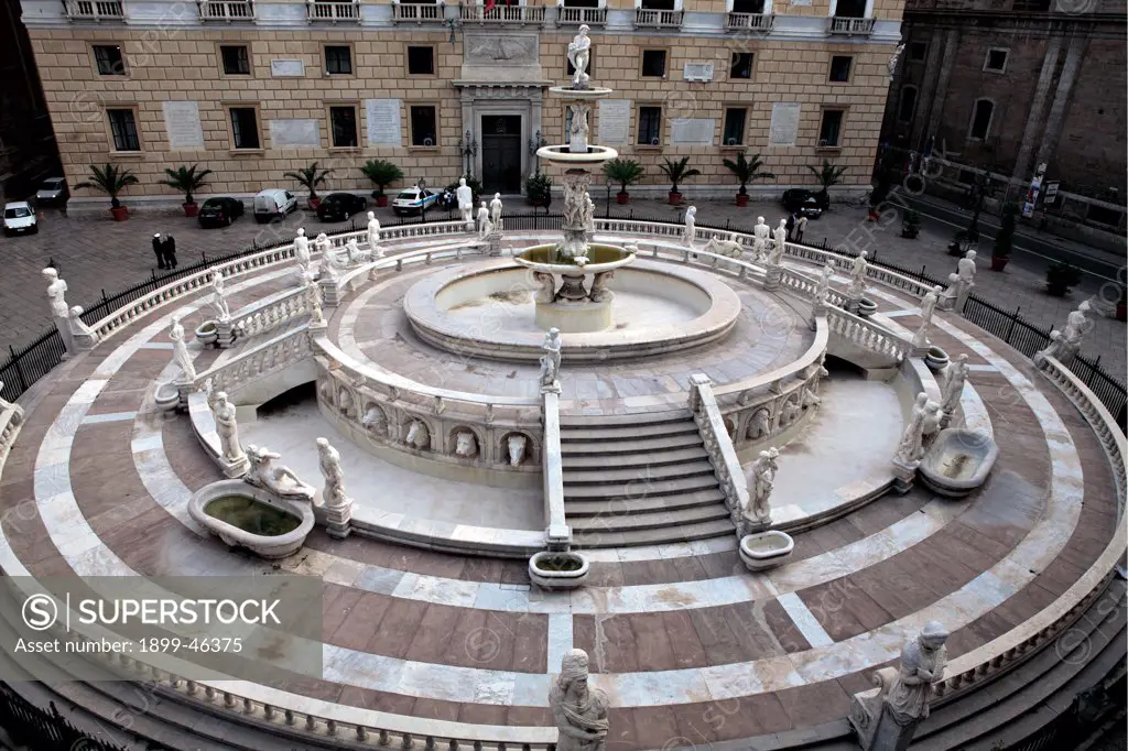 Palermo, Pretoria Fountain, by Camilliani Francesco, 1555, 16th Century, . Italy: Sicily: Palermo: Pretoria Fountain. View from above fountain Piazza Pretoria Palermo steps/stairs balustrade basin marble pagan divinities staircase cherubs/putti muses animals circle