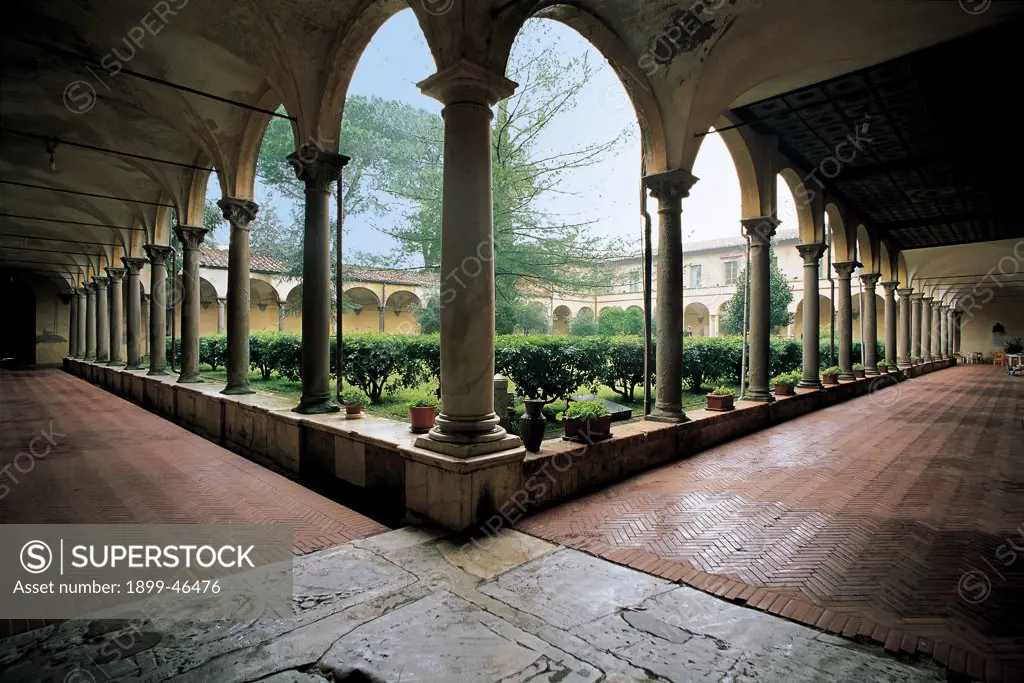 San Francesco, Pisa, by Unknown artist, 1264, 13th Century, brick, white and grey marble. Italy: Tuscany: Pisa: San Francesco. Detail. Cloister gallery smooth cross vaults columns round arches garden