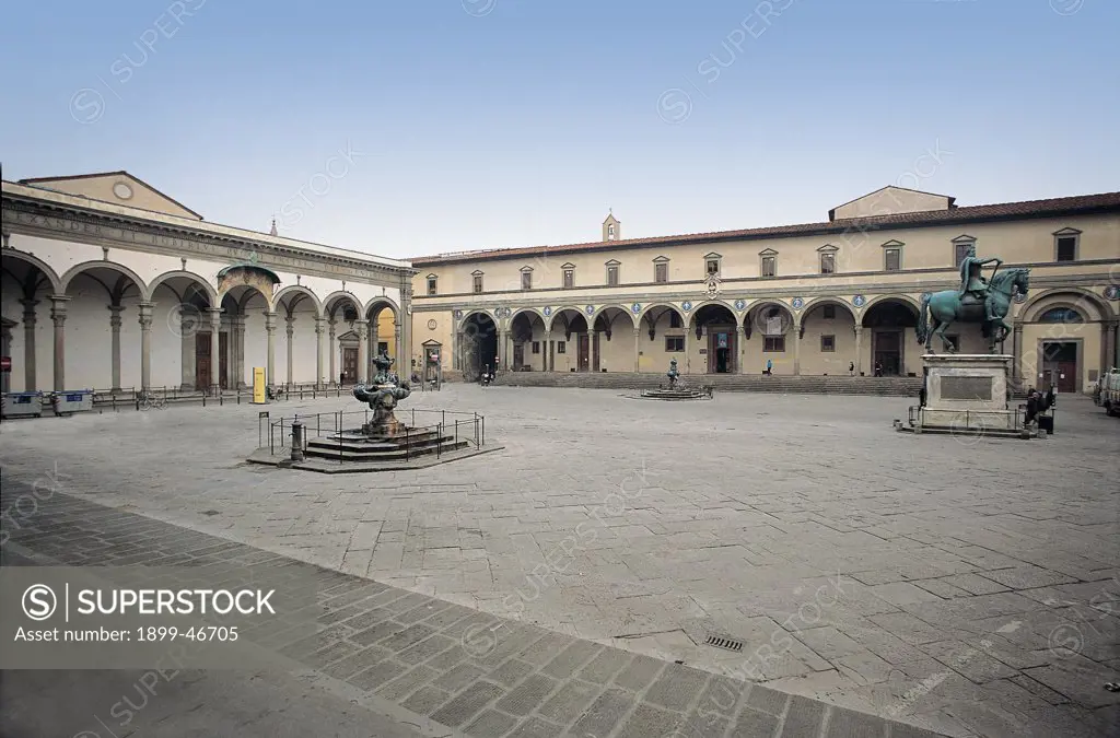 Hospital of the Innocents External, by Brunelleschi Filippo, 1419 - 1439, 15th Century, . Italy: Tuscany: Florence: Ospedale degli Innocenti. Square portico with nine bays steps/staircase square round spandrels