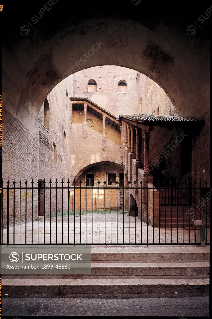 Palazzo del Podesta - Mantua, by Unknown artist, 1227, 13th Century, . Italy: Lombardy: Mantua: Palazzo del Podesta. View Sottoportico dei Lattonai late-Gothic staircase internal courtyard Palazzo del Podesta gate arch