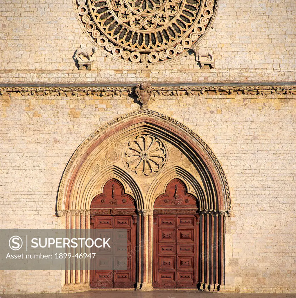 Upper Basilica of San Francesco, by Unknown artist, 1228 - 1253, 13th Century, . Italy: Umbria: Perugia: San Francesco Upper Basilica. Detail. Front/facade geminous portal/doorway ogival/lancet/pointed arch trilobate/three-lobe arches lobate splay cornice