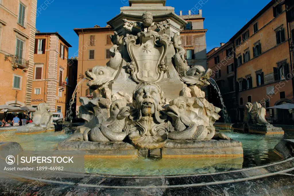 Fountain in Piazza della Rotonda, by Sormani L., Della Porta Giacomo, 1575, 16th Century, . Italy: Lazio: Rome: Piazza della Rotonda. View Fountain Piazza della Rotonda Rome dolphins masks