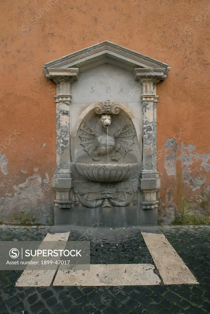Fountain in Via Conciliazione, by Unknown artist, 17th Century, . Italy: Lazio: Rome: Via della Conciliazione. View fountain basin shell dragon aedicule festoon