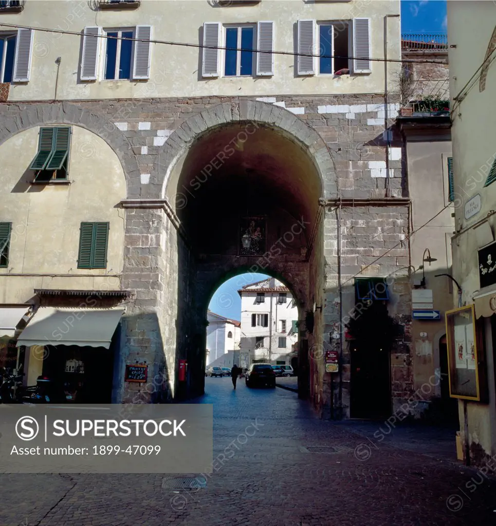 Porta dei Borghi, by Unknown artist, 12th Century, white limestone, gray sandstone. Italy: Tuscany: Lucca: Porta dei Borghi. Whole artwork. Gate entry arch stone white gray