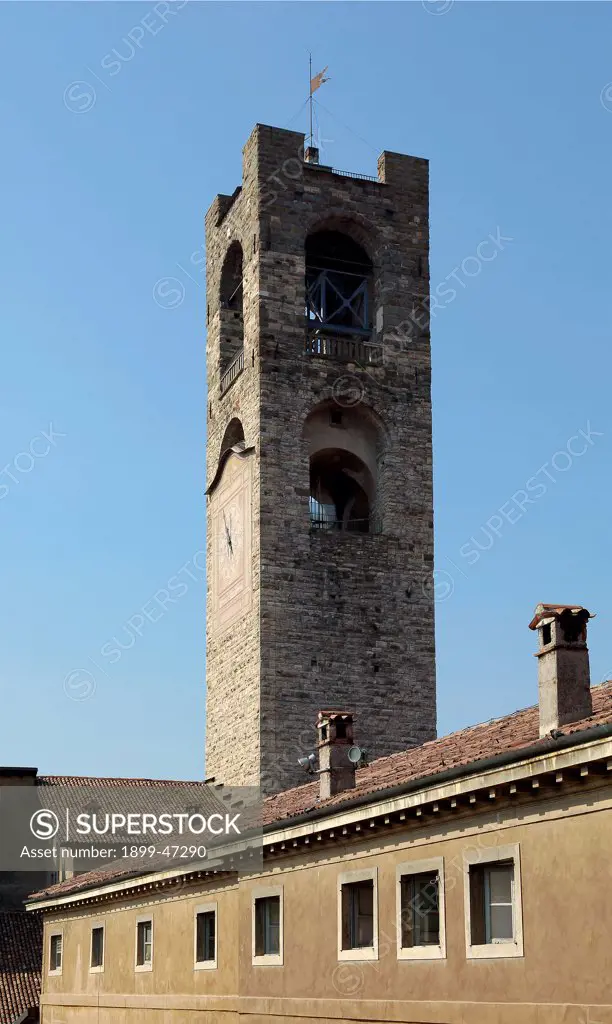 Campanone or Civic Tower, by Unknown artist, 11th Century, . Italy: Lombardy: Bergamo: Piazza Vecchia. Square tower buildings clock sun-dial quoins arcading city/town Bergamo