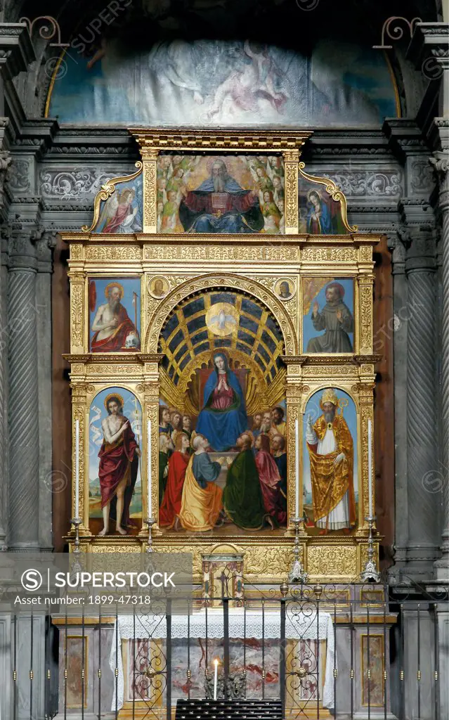Pentecost Polyptych, by Ambrogio da Fossano known as Bergognone, 1507, 16th Century, . Italy: Lombardy: Bergamo: Santo Spirito church. Whole artwork. Polyptych enthroned Madonna Descent of the Holy Spirit/Holy Ghost apostles Pentecost dove St Jerome St Augustine perspective frame gold reliefs altar St Francis Agnus Dei Jesus Christ processional cross scroll/cartouche
