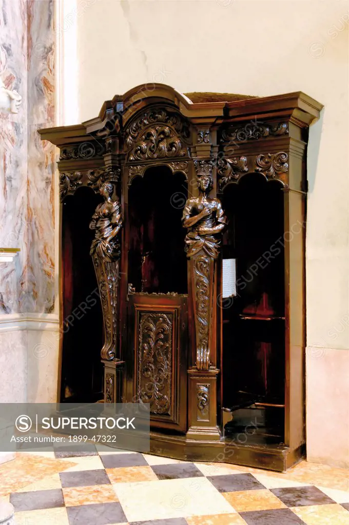 Confessional, by Unknown artist, 18th Century, carved wood. Italy: Lombardy: Bergamo: Sant'Alessandro della Croce Church. View wooden confessional herms rinceaux phytomorphic motifs
