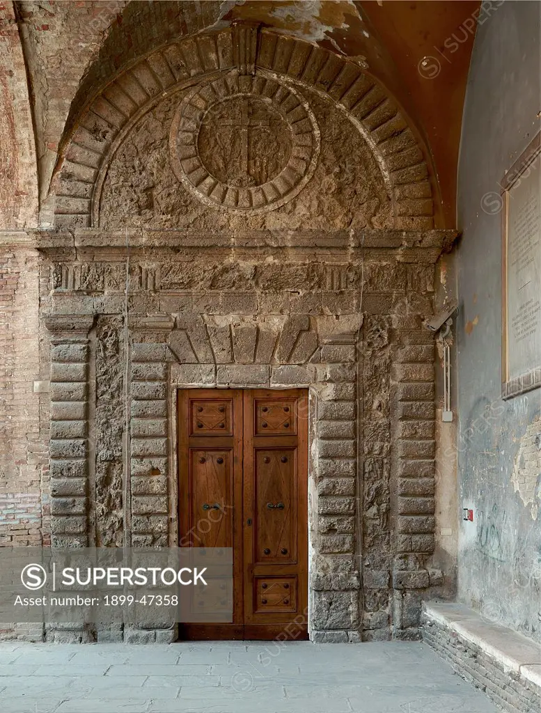Oratory of the Cave, by Unknown artist, 16th Century, . Italy: Marche: Pesaro Urbino: Urbino: Grotta Oratory. Doorway rustication/ashlar-work symbol of the Company of Humility lunette travertine triglyphs decoration