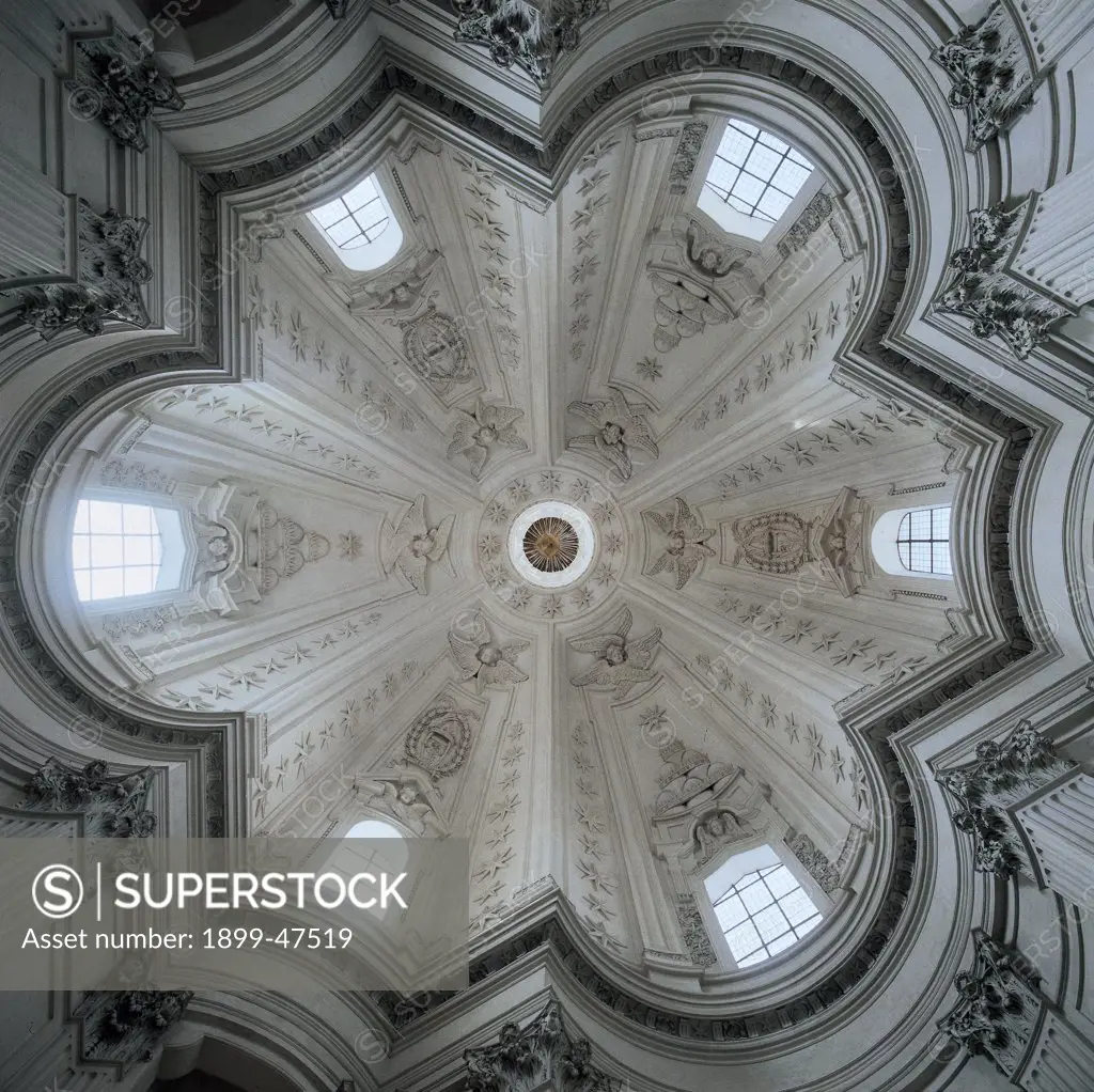 Church of Sant'Ivo alla Sapienza, Rome, by Castelli Francesco known as Borromini, 1642 - 1662, 17th Century, Unknow. Italy, Lazio, Rome, Sant'Ivo alla Sapienza Church. Interior church dome profile with varying lines of projection segments white windows light.