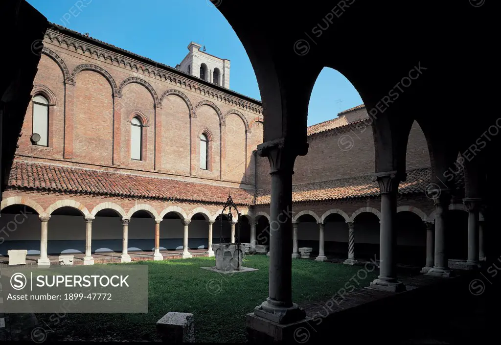 Cloister of San Romano, by Unknown, Unknow, Unknow. Italy, Emilia Romagna, Ferrara, former San Romano church, cloister. Foreshortened view cloister arches arcades porch: portico columns base shaft capitals well cortile interior garden roof tegole church bell-tower windows pilaster.