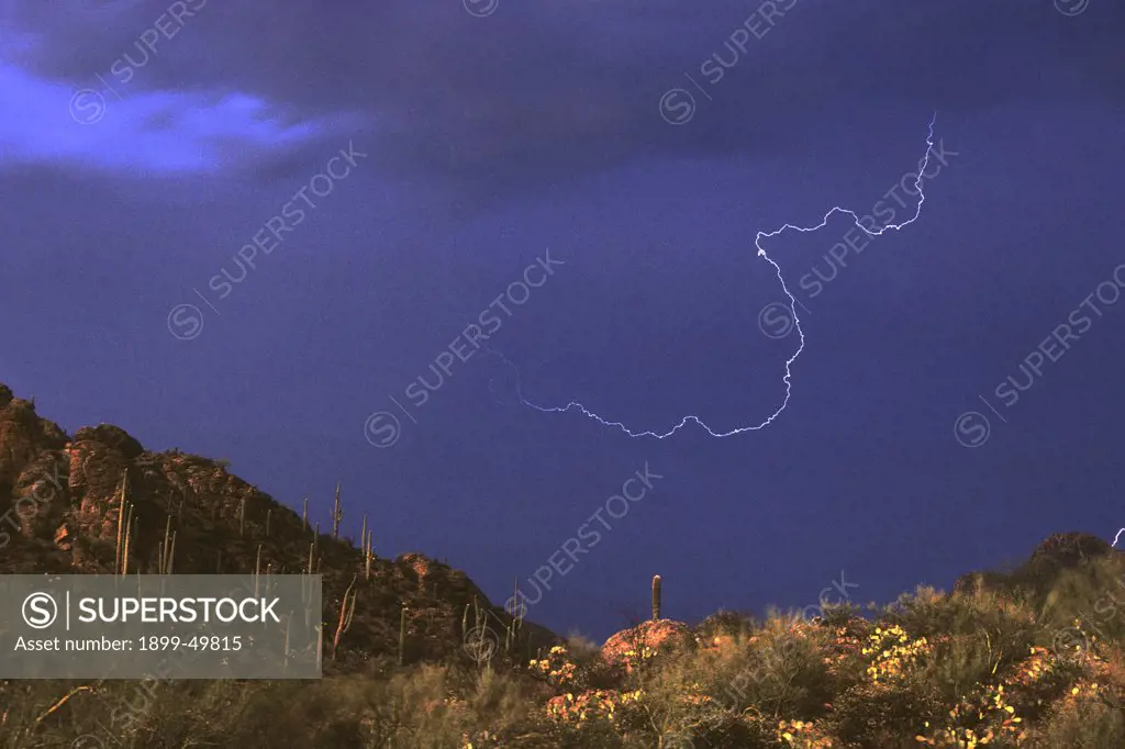 Air discharge lightning, possibly a single stroke, of scientific interest. Photographed shortly before sunset in the Sonoran Desert. Gates Pass, Tucson Mountains, Tucson, Arizona, USA.