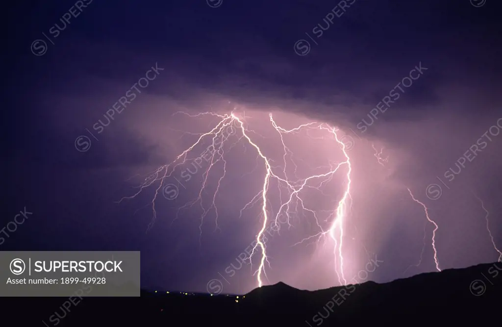Forked cloud-to-ground lightning with lateral discharge channels.  Tucson Mountains, Tucson, Arizona, USA.