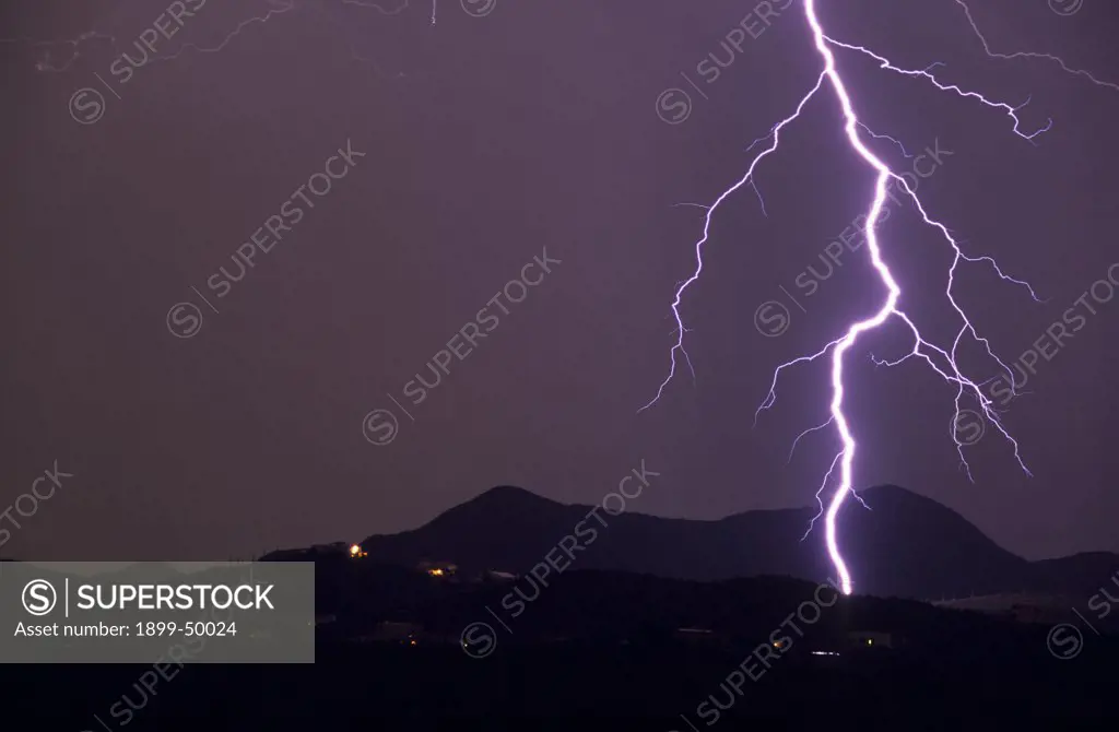 Brilliant cloud-to-ground lightning strike.  Tucson, Arizona, USA.