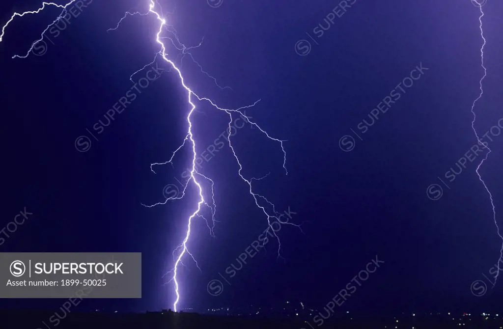 Single cloud-to-ground lightning strike.  Tucson, Arizona, USA.