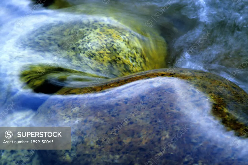 Detail of water flowing over rocks in a fork of the Tuolumne River.   Eastern Sierra Nevada, Yosemite National Park, California, USA.