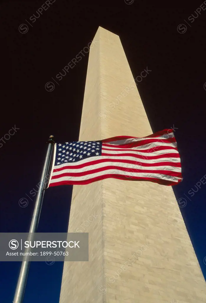 Washington, Dc. Washington Monument And American Flag