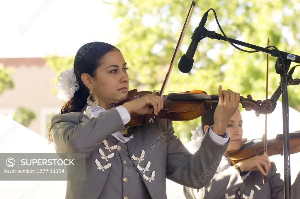 Fiesta De Santa Fe, New Mexico. A Celebration Started In 1712 To Celebrate The Peaceful Retaking Of The City From The Pueblo People In 1692. Mariachi Musicians.