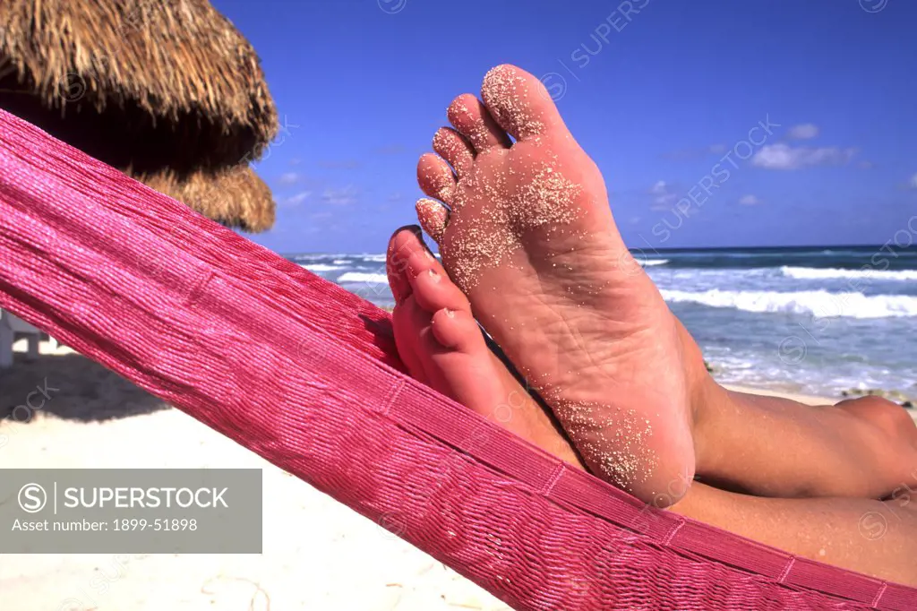Mexico, Cozumel. Close-Up Of Feet In Hammock
