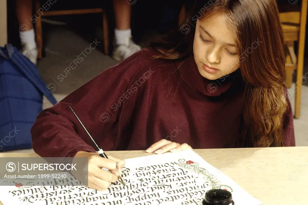 Student Working On Calligraphy