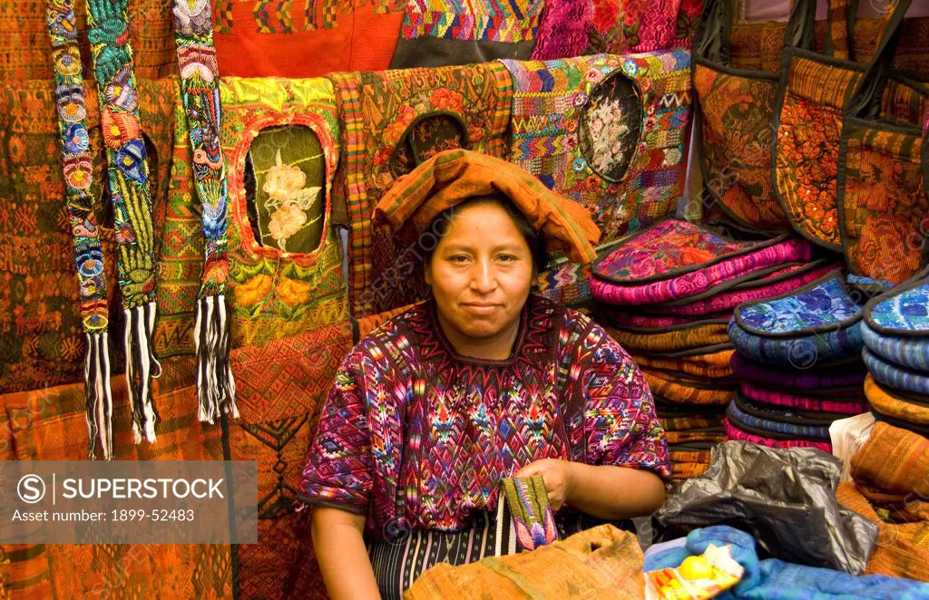 Woman Selling Artwork In Chichicastenango, Guatemala