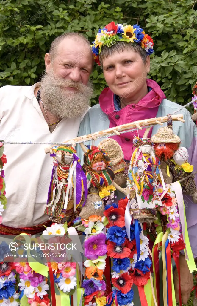 Man With Beard And Woman In Traditional Dress In Kiev, Ukraine.