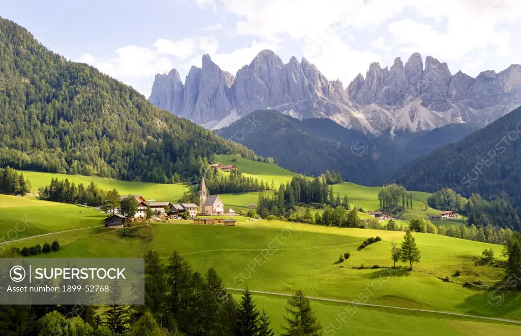 Isolated Church Called Rainui In The Italian Dolomites Village Of Val Di Funes, Italy