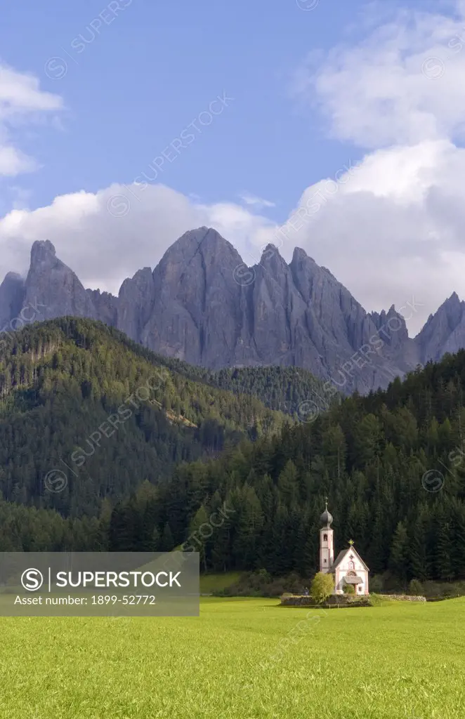 Isolated Church Called Rainui In The Italian Dolomites Village Of Val Di Funes, Italy