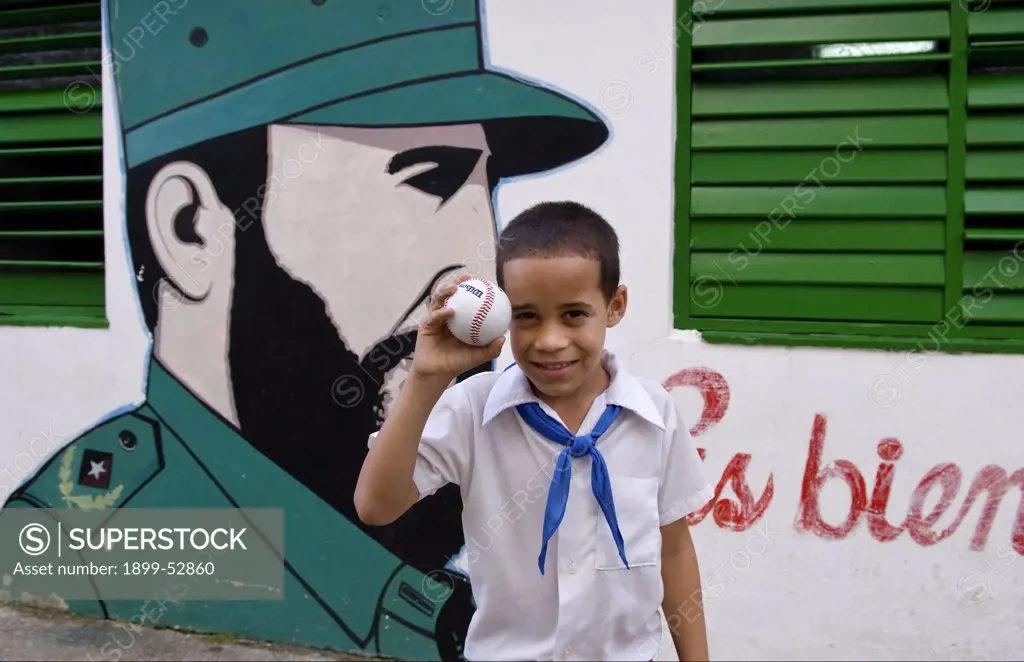 Group Of Students In School In Las Terrazas In Sierra Del Rosario, Cuba, With Mural Of Fidel Castro.