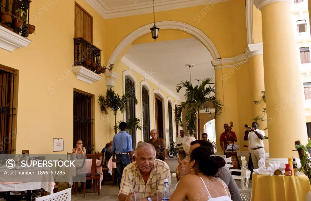 Havana, Cuba, Couple In Bar. Cafe Santo Angel In Old Havana
