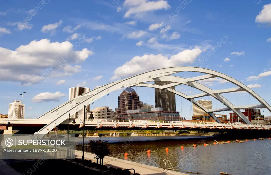Rochester New York Skyline With The Genesee River And The Susan B. Anthony And Fredrick Douglas Bridge