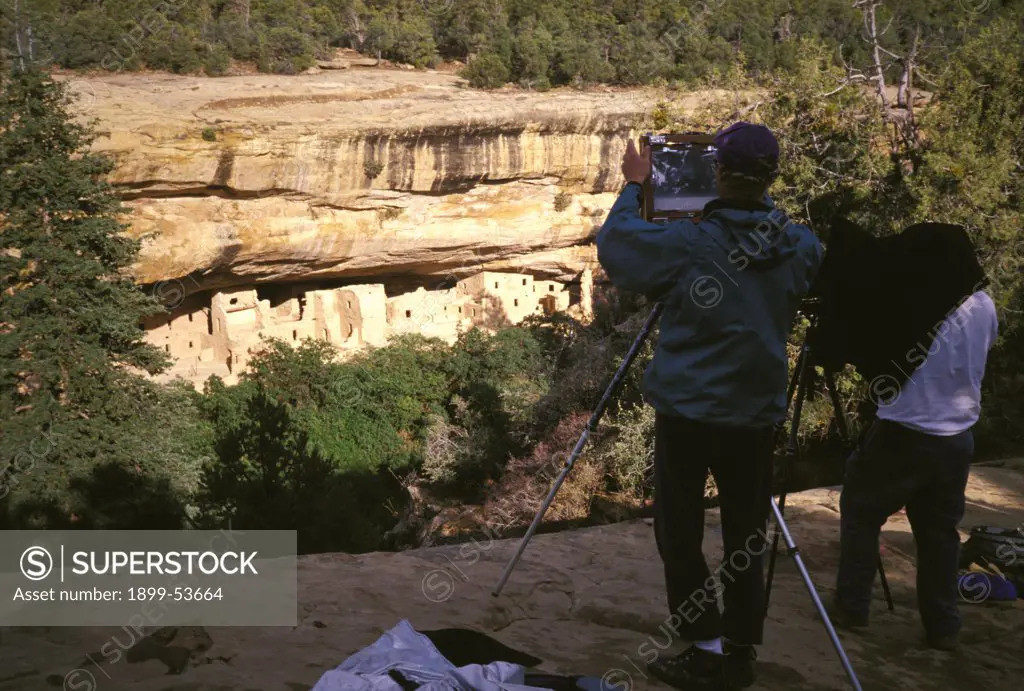 Colorado, Mesa Verde National Park. Photographers Photographing Spruce Tree House Overlook