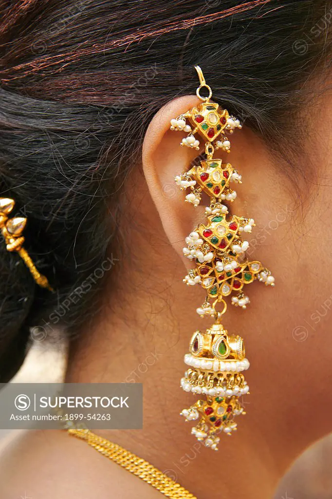 Earring Worn By An Indian Gujarati Woman During A Gujarati Wedding. The Jewelry Is Called 'Jadtar' In Gujarati, India